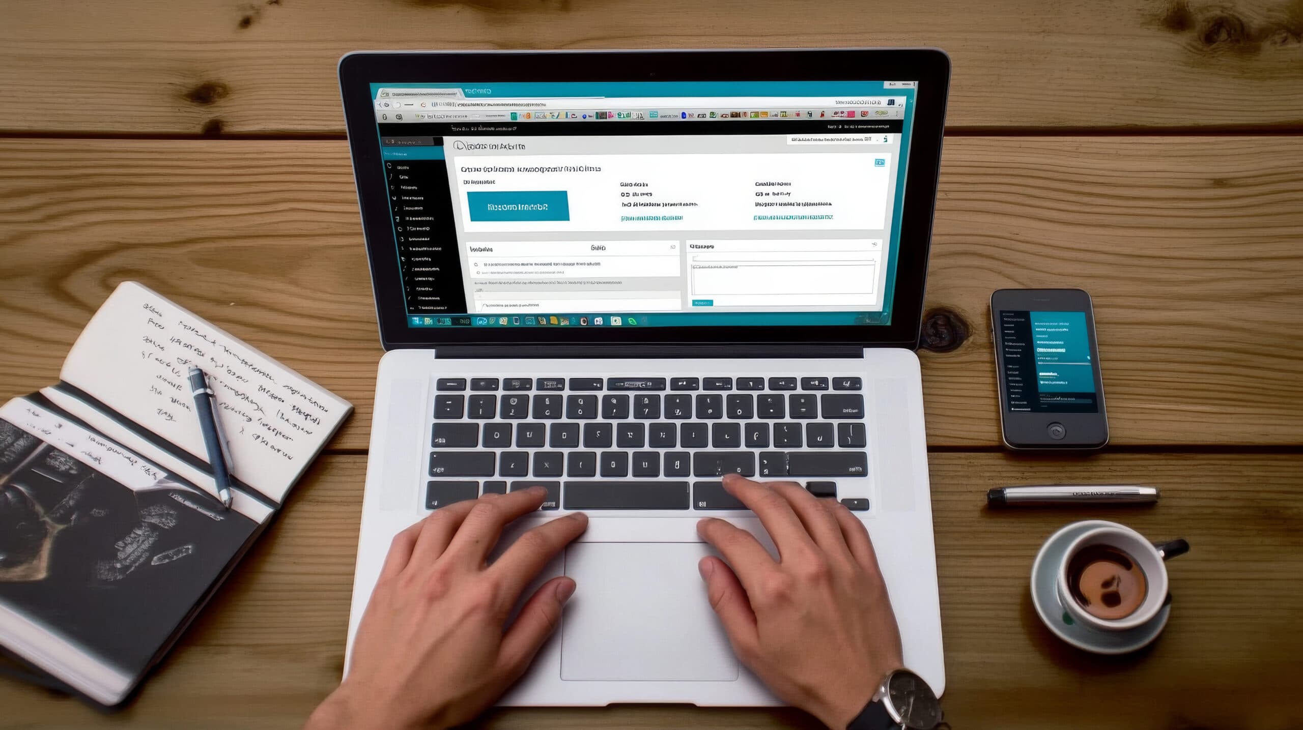 WordPress Development featured image overhead shot of hands on a laptop